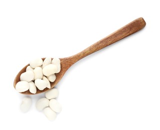 Photo of Spoon with uncooked navy beans on white background, top view