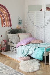 Photo of Modern girl's bedroom interior with stylish furniture. Idea for design