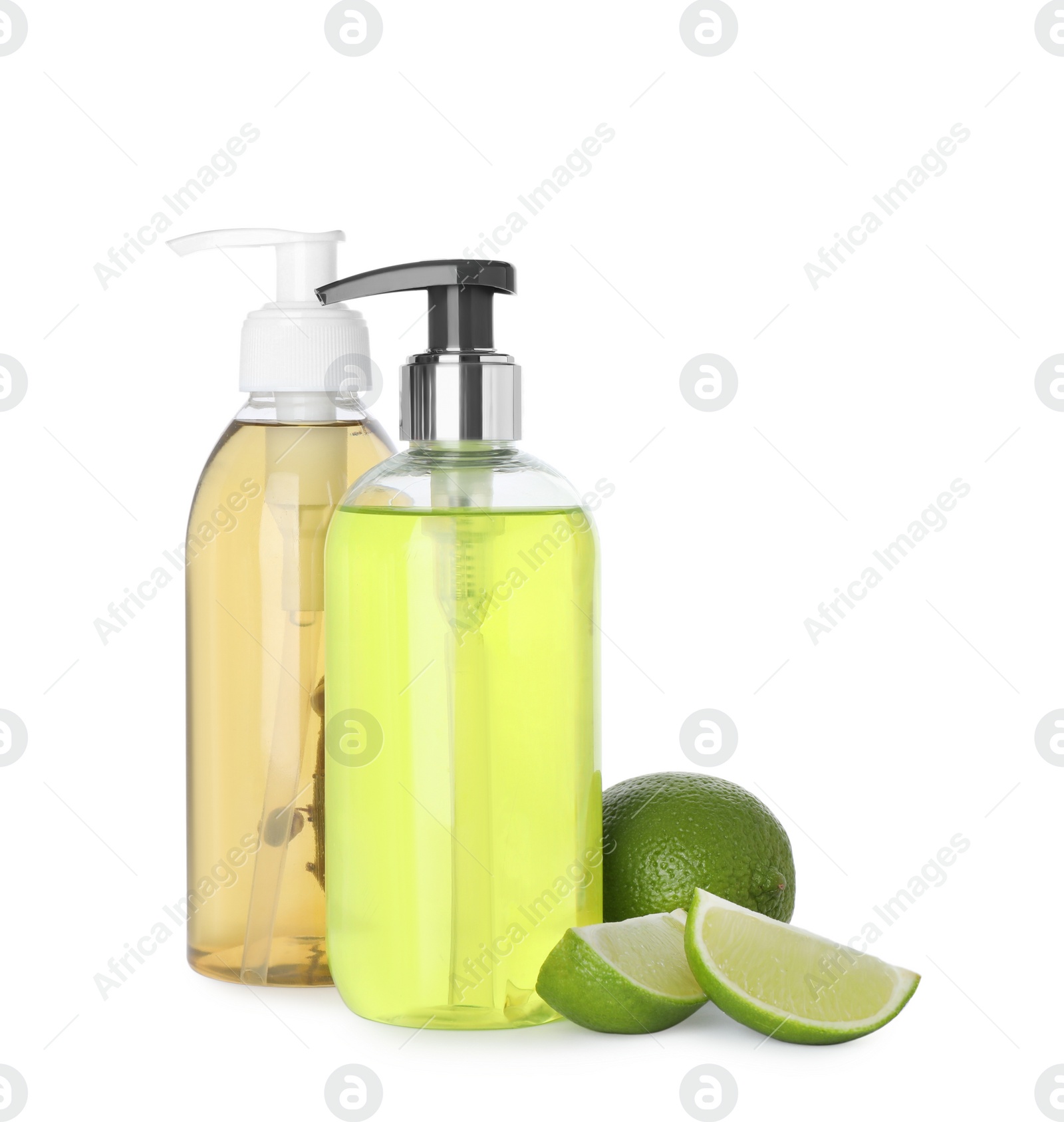 Photo of Dispensers with liquid soap and limes on white background