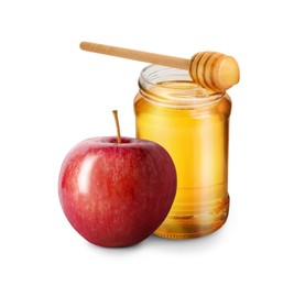 Image of Honey in glass jar, apple and dipper isolated on white