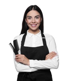 Photo of Portrait of happy hairdresser with professional combs on white background