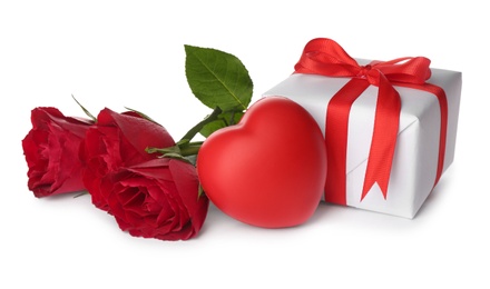 Photo of Beautiful gift box, roses and red heart on white background. Valentine's day celebration