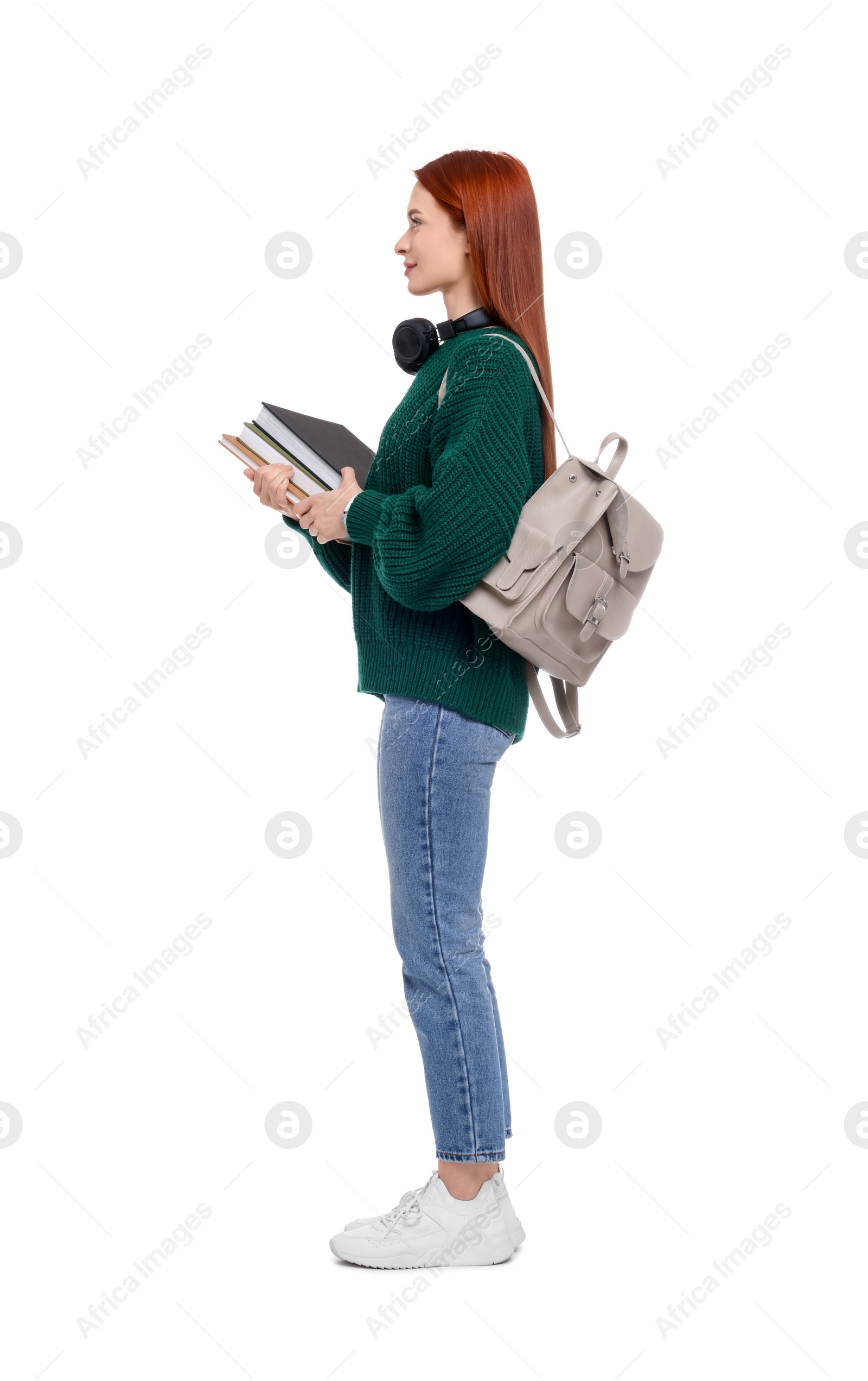 Photo of Woman with backpack and books on white background