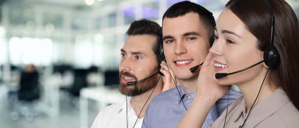 Hotline operators with headsets in office, space for text. Banner design