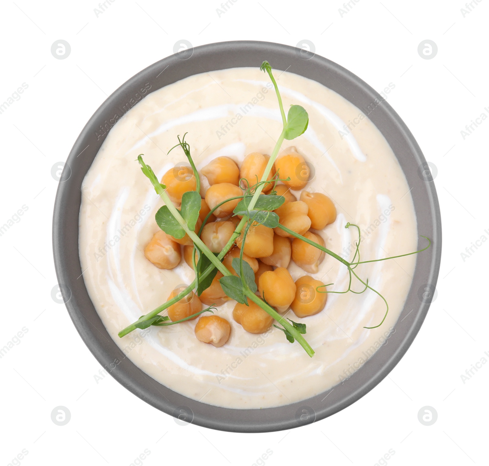 Photo of Tasty chickpea soup in bowl on white background, top view