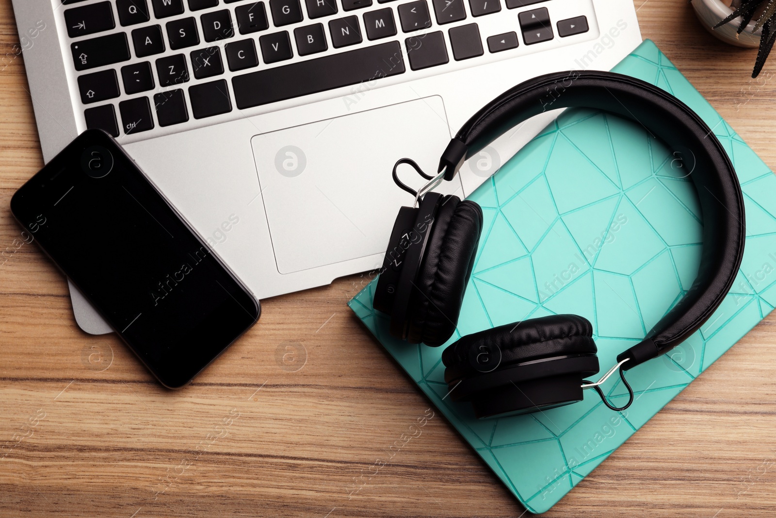 Photo of Flat lay composition with headphones on table. Space for text