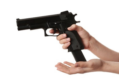 Photo of Woman reloading gun on white background, closeup