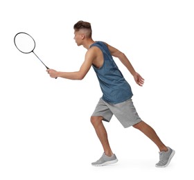 Young man playing badminton with racket on white background