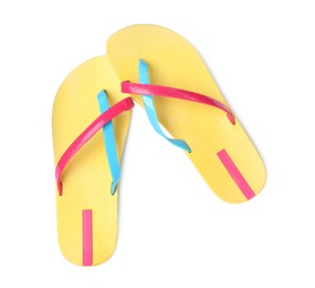 Photo of Pair of yellow flip flops isolated on white, top view