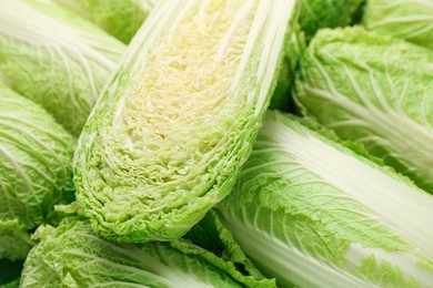 Photo of Fresh ripe Chinese cabbages as background, closeup