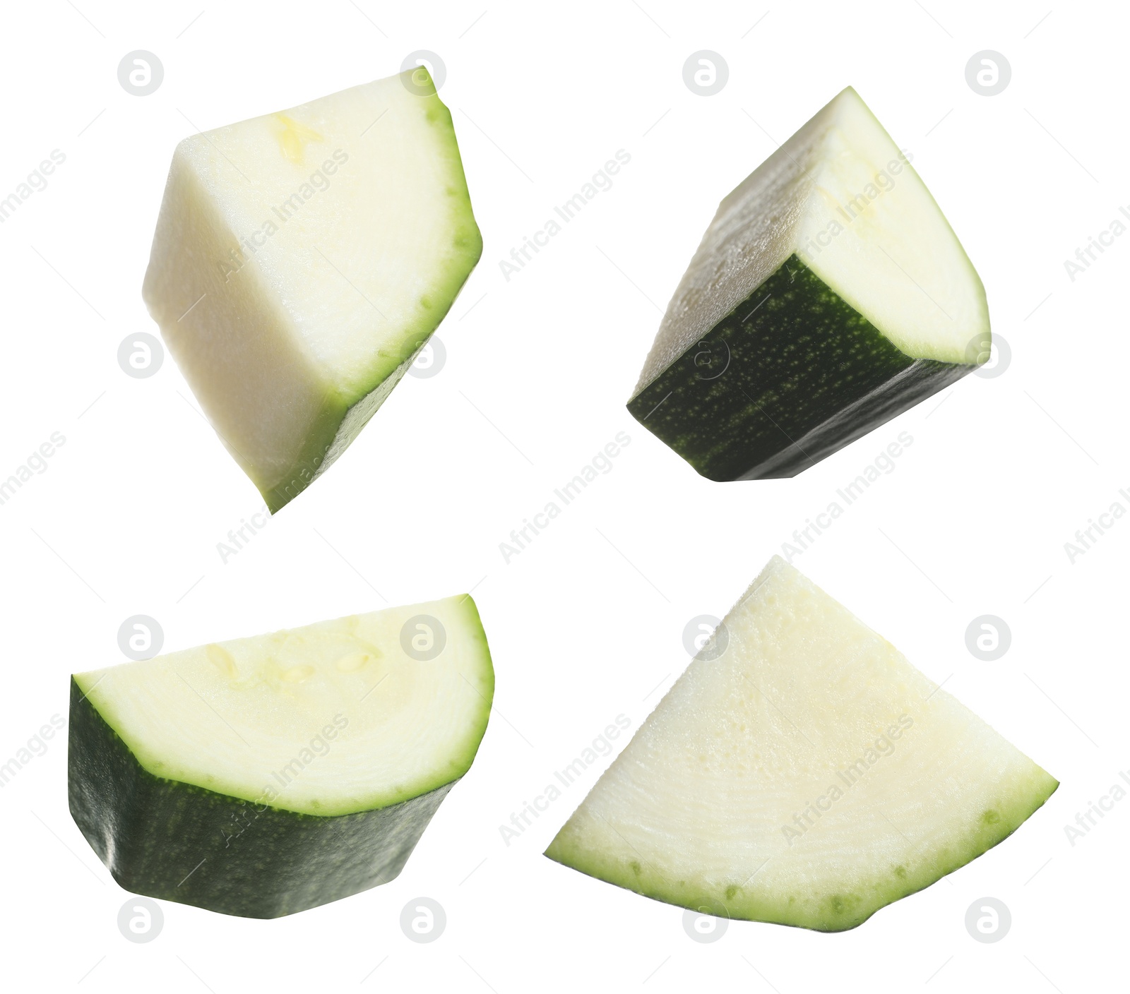 Image of Set with pieces of fresh ripe zucchini on white background