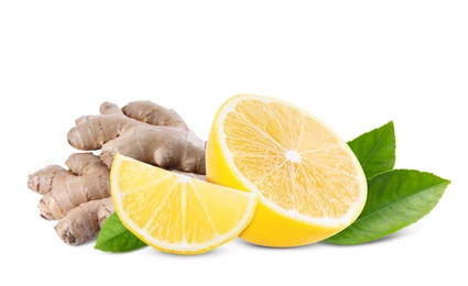 Image of Fresh ginger root and lemon on white background