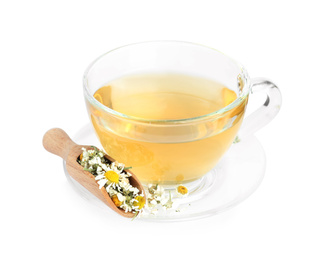 Photo of Fresh chamomile tea and dry flowers in scoop isolated on white