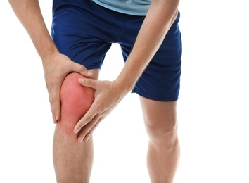 Photo of Man having knee problems on white background, closeup