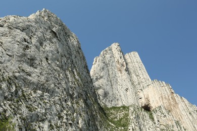 Photo of Picturesque landscape with high mountains under blue sky outdoors