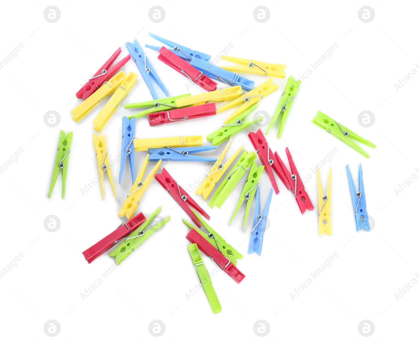 Photo of Colorful plastic clothespins on white background, above view