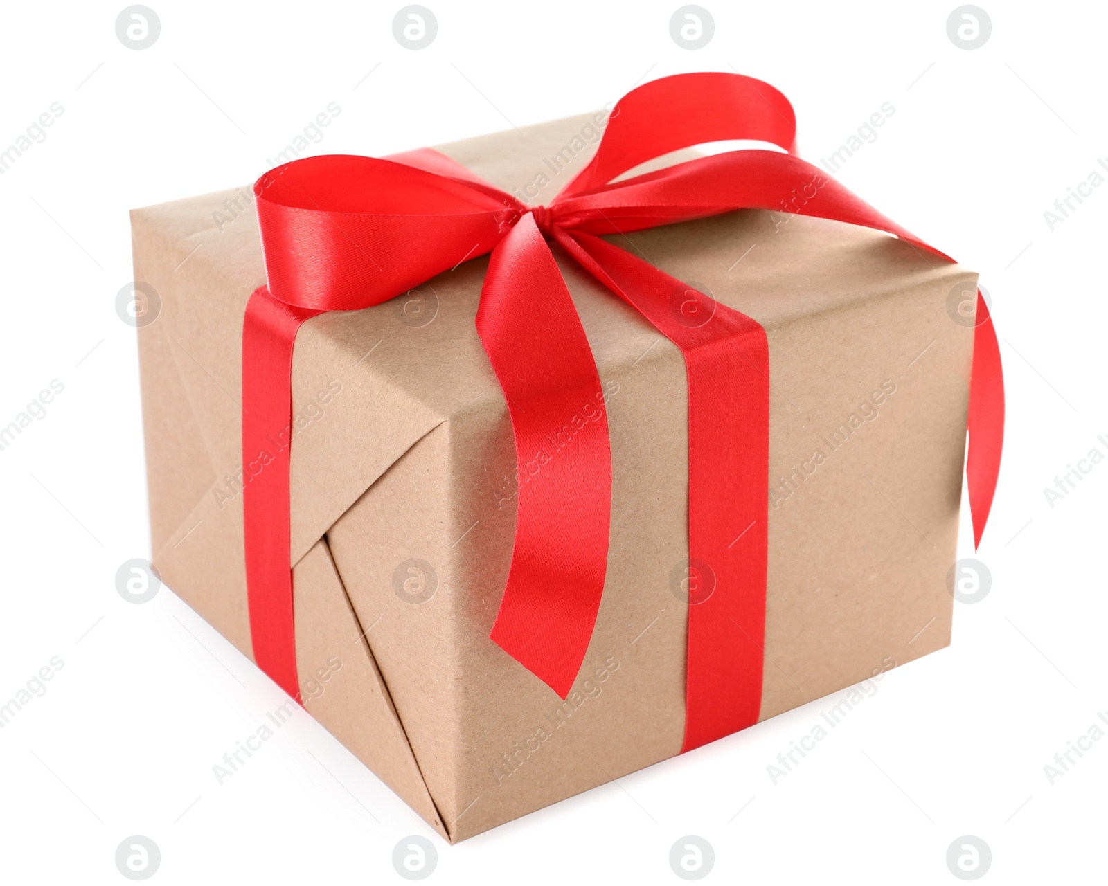 Photo of Christmas gift box decorated with ribbon bow on white background