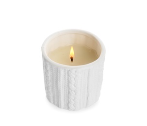 Photo of Burning wax candle in holder on white background