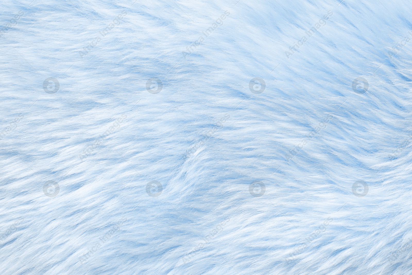 Image of Texture of light blue faux fur as background, closeup