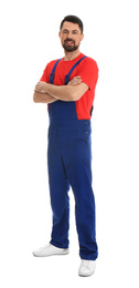 Full length portrait of professional auto mechanic on white background