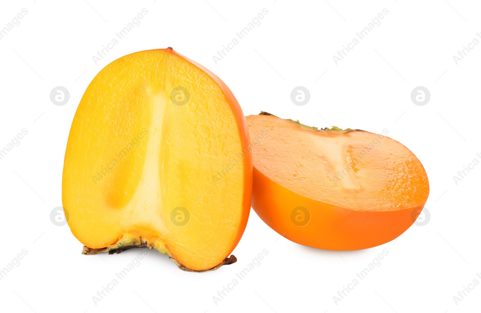 Photo of Halves of delicious ripe juicy persimmons on white background