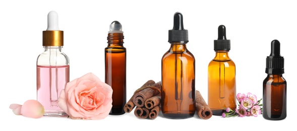 Image of Set of different essential oils used in aromatherapy on white background, banner design
