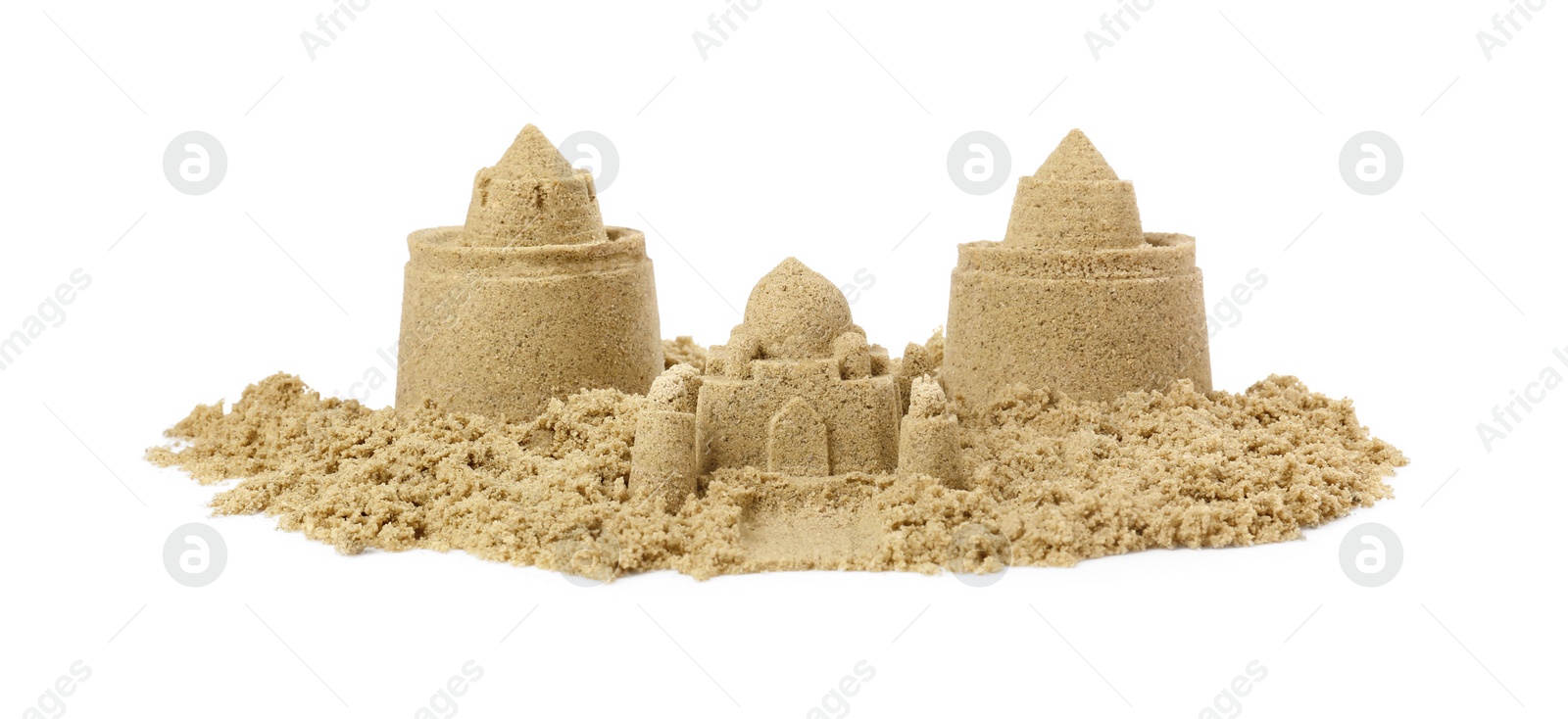 Photo of Pile of sand with beautiful castles isolated on white