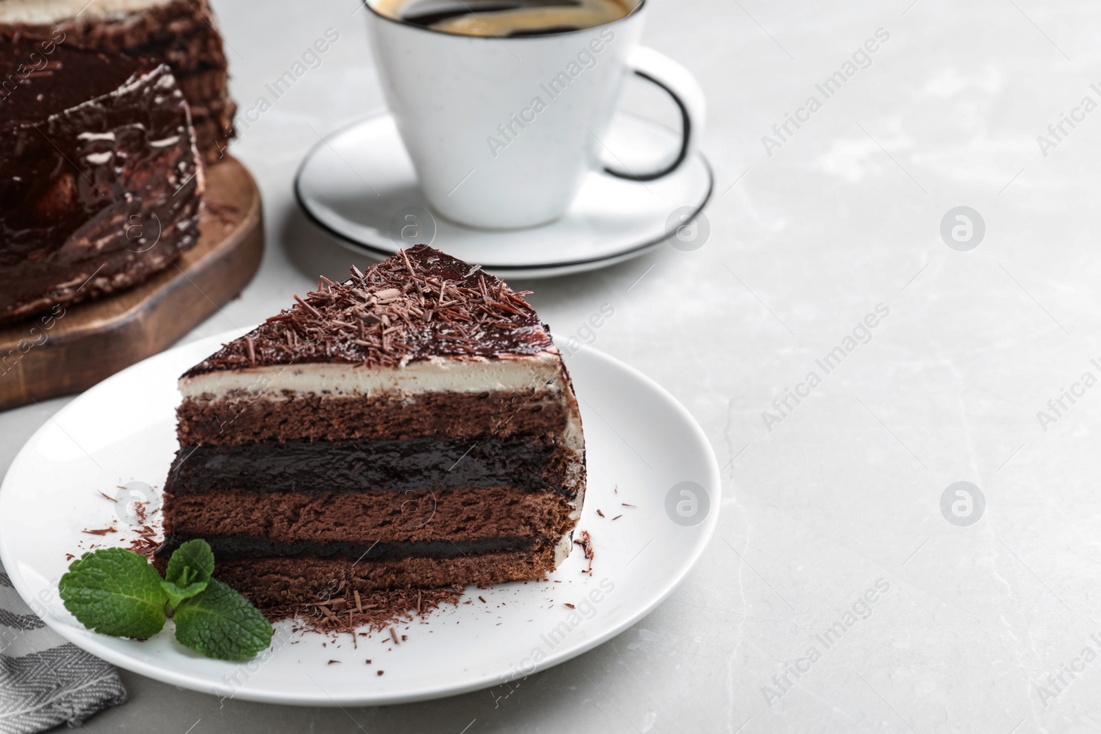 Photo of Tasty chocolate cake on table. Space for text