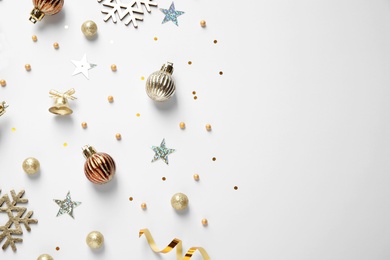 Photo of Flat lay composition with Christmas decorations on white background