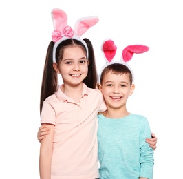 Photo of Cute children in Easter bunny ears headbands on white background