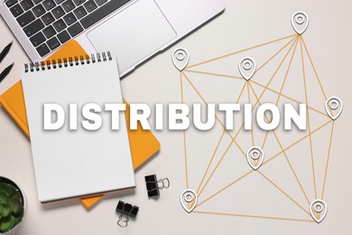 Image of Distribution. Laptop and different stationery on white desk, flat lay. Scheme with destination points