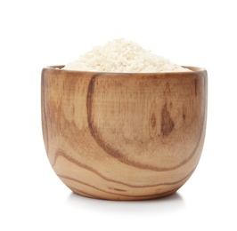 Bowl with uncooked rice on white background