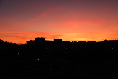 Photo of Picturesque view of beautiful sunset over city