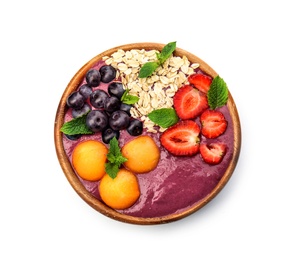 Bowl with tasty acai smoothie on white background, top view