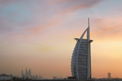 DUBAI, UNITED ARAB EMIRATES - NOVEMBER 03, 2018: Beautiful view of famous Burj Al Arab and amazing sunset sky