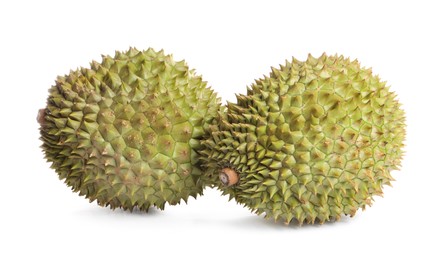 Whole ripe durian fruits on white background