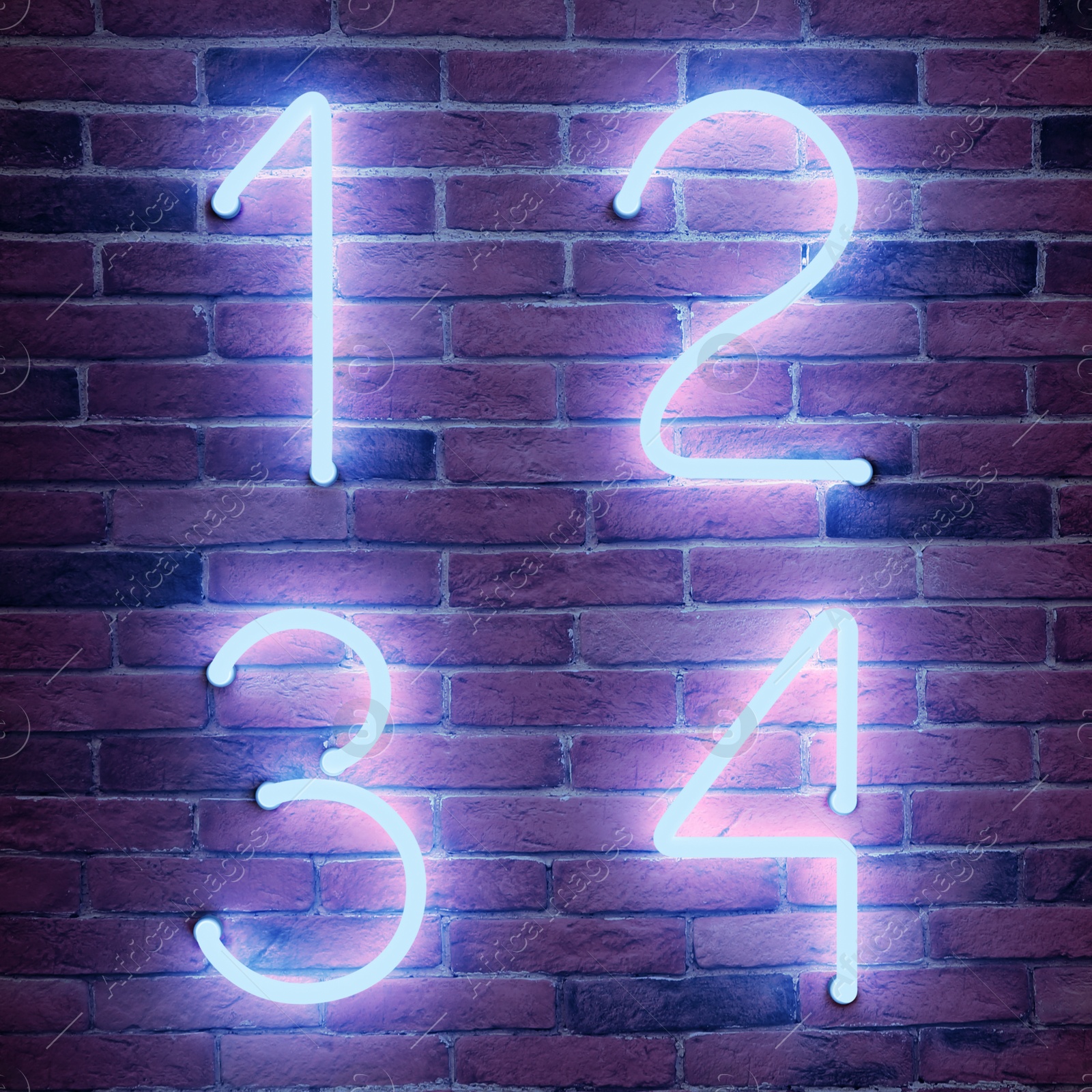 Image of Glowing neon number (1, 2, 3, 4) signs on brick wall