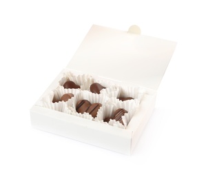 Delicious heart shaped chocolate candies in box isolated on white