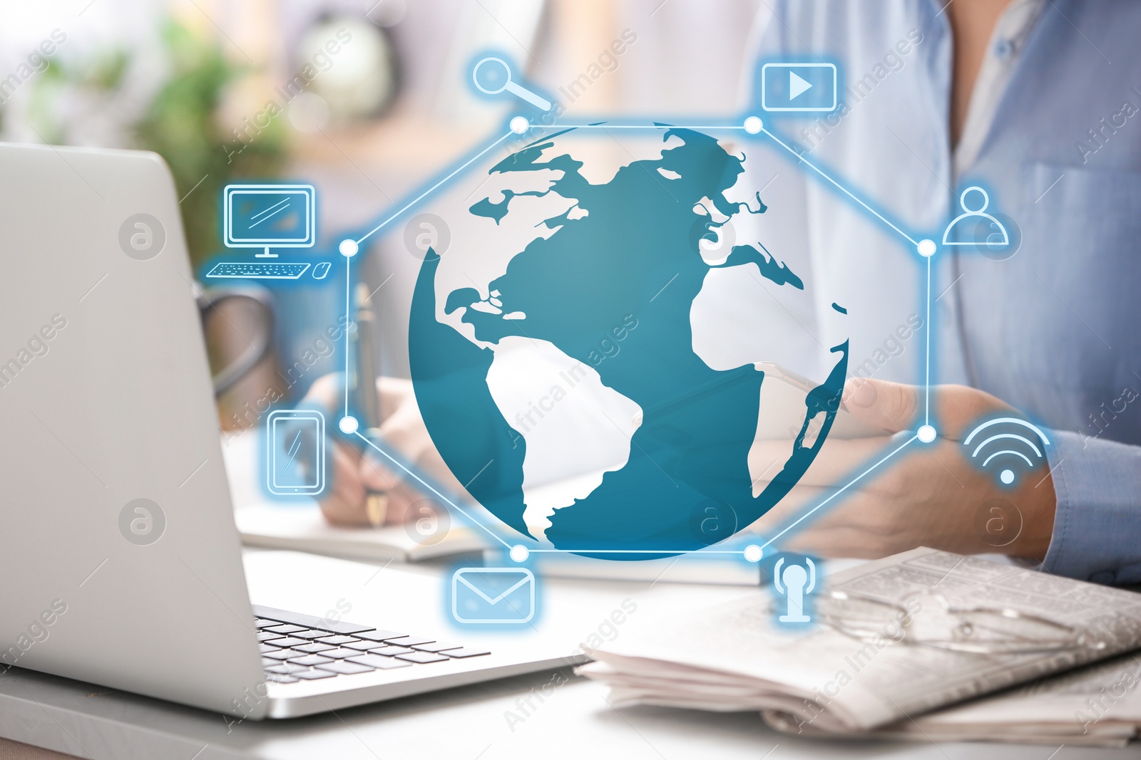 Image of Global network technology. Woman working with laptop at table, closeup