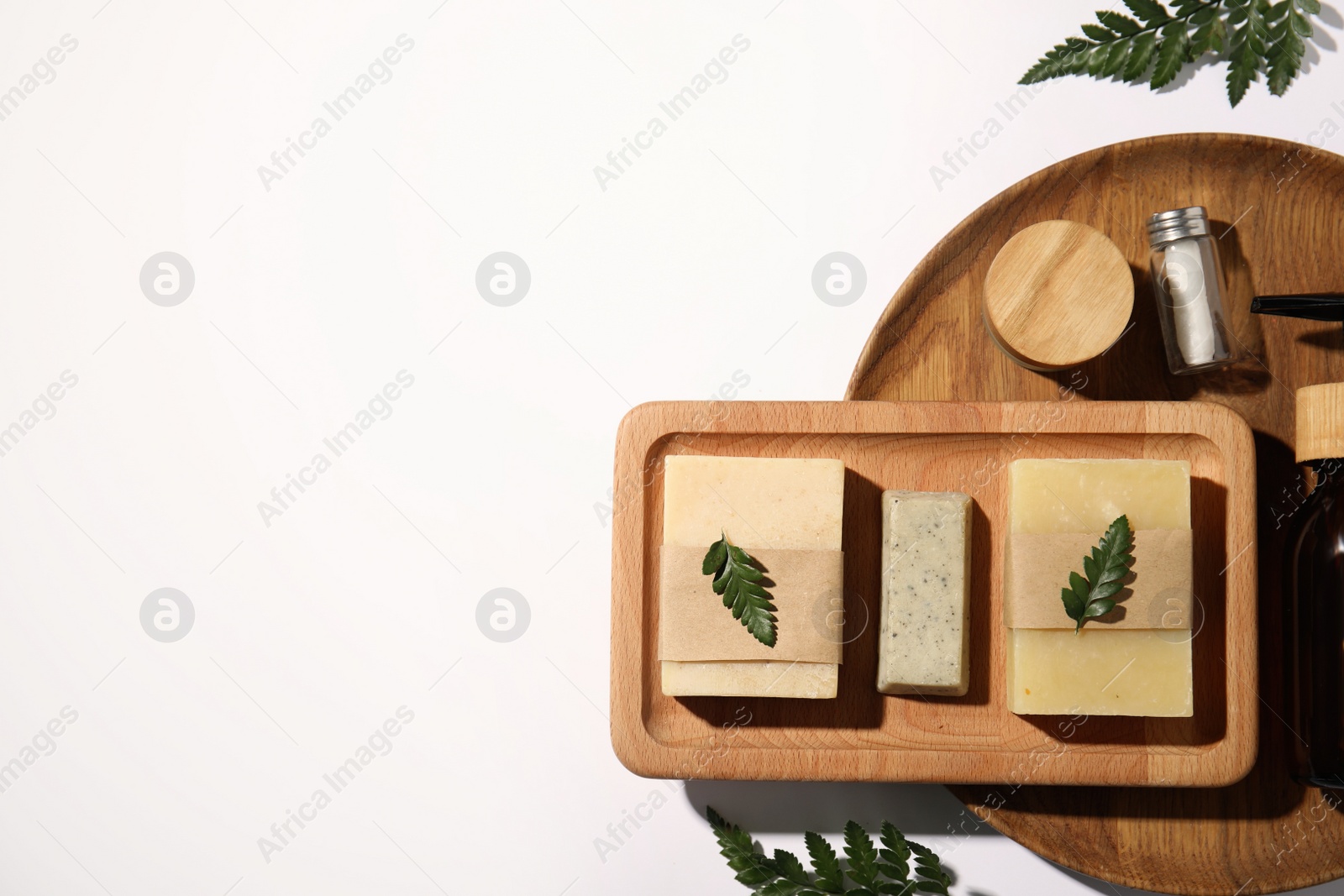 Photo of Eco friendly personal care products on white background, top view. Space for text