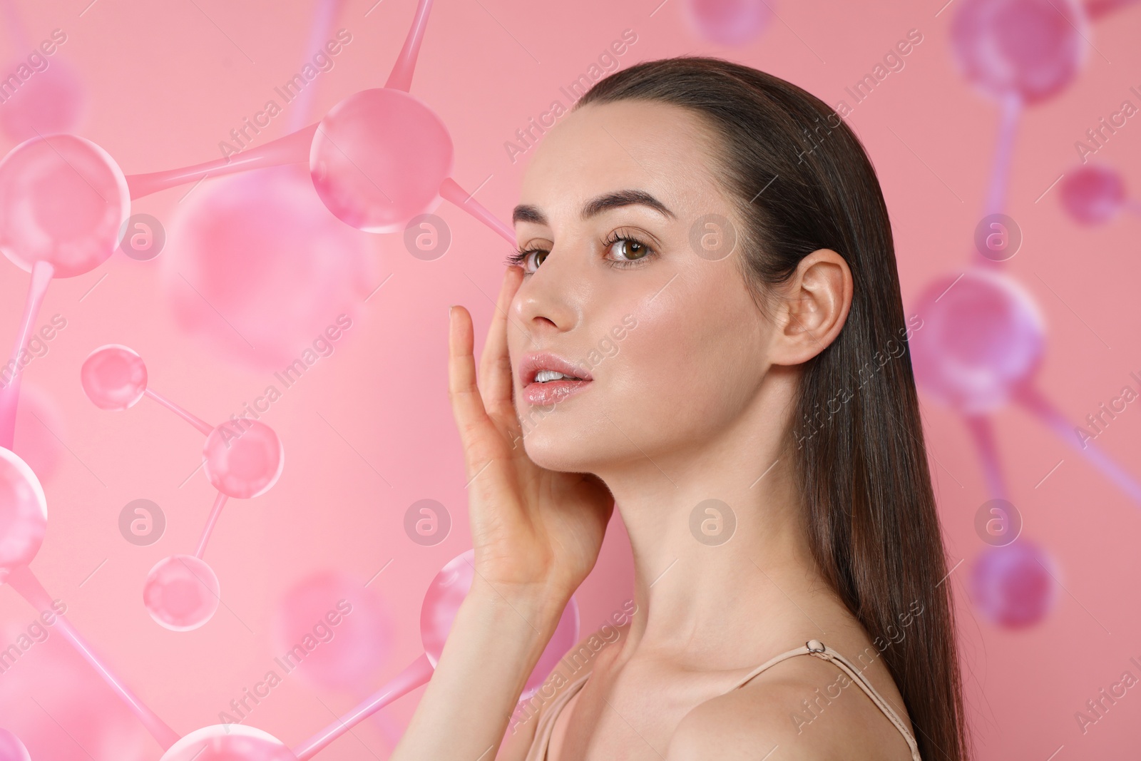 Image of Beautiful woman with perfect healthy skin and molecular model on pink background. Innovative cosmetology