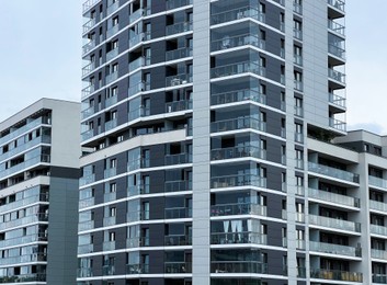 Photo of Exterior of modern multistory buildings with balconies
