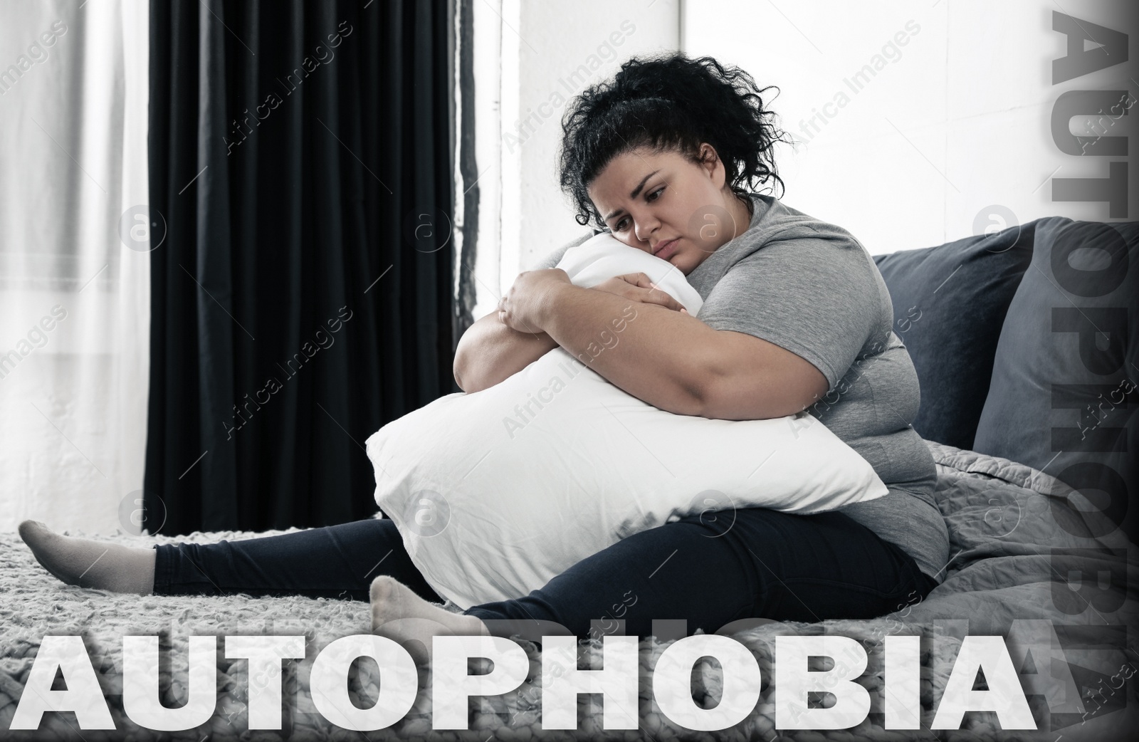 Image of Depressed overweight woman sitting alone on bed at home. Autophobia - fear of isolation