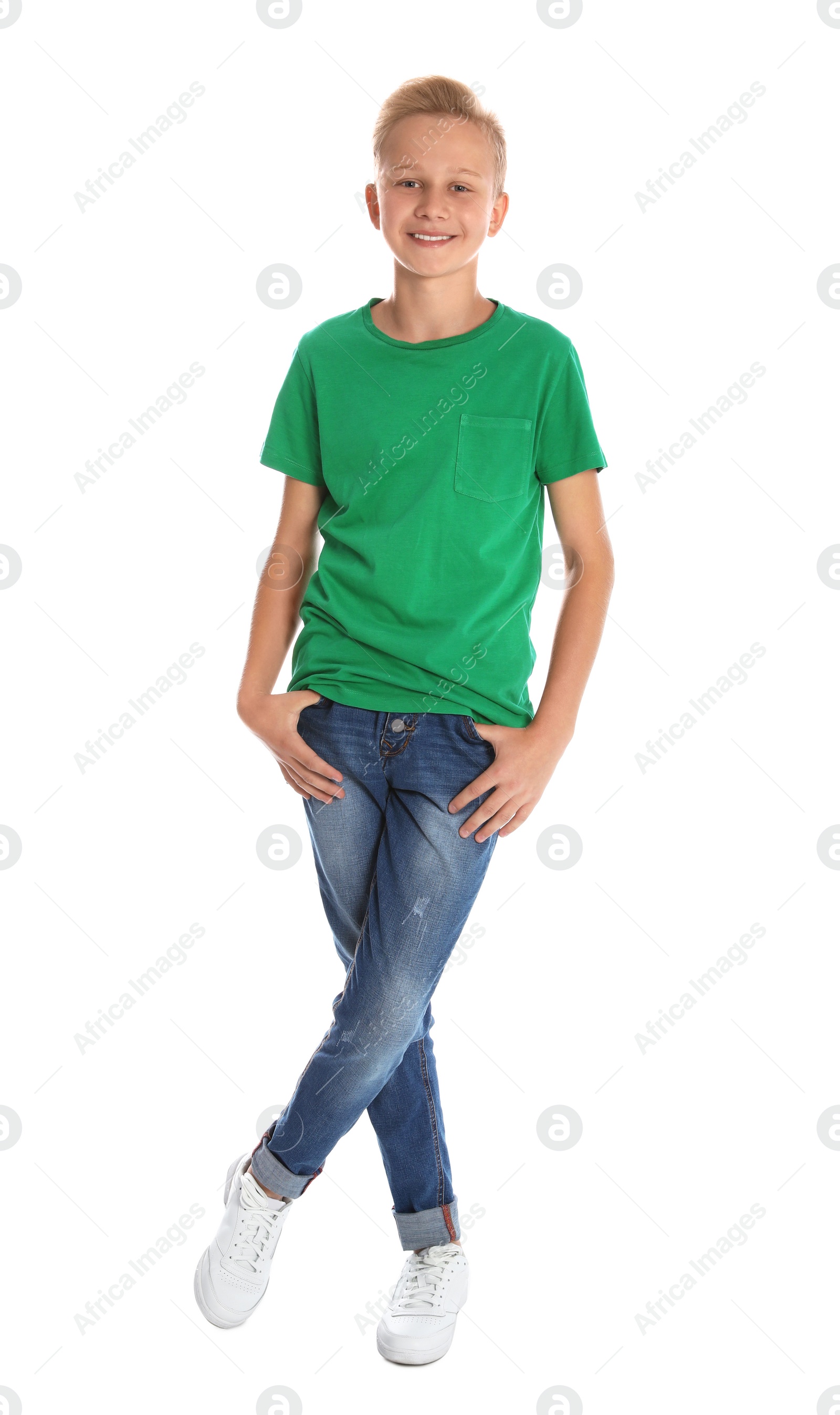 Photo of Full length portrait of teenage boy on white background