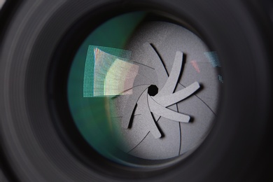 Camera lens of professional photographer, closeup view