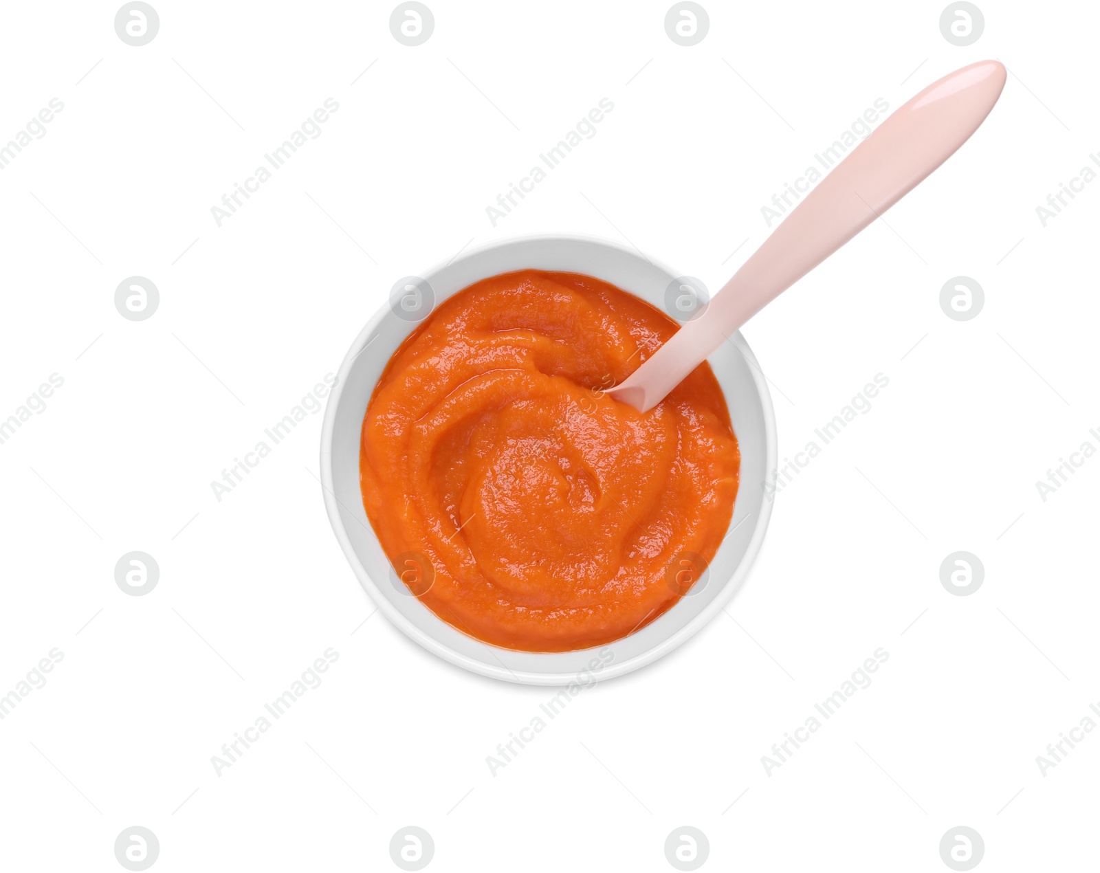 Photo of Bowl with healthy baby food and spoon isolated on white, top view