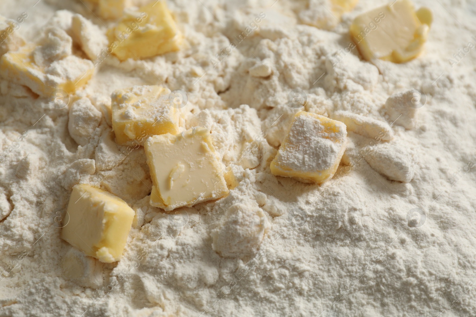 Photo of Making shortcrust pastry. Flour and butter, closeup