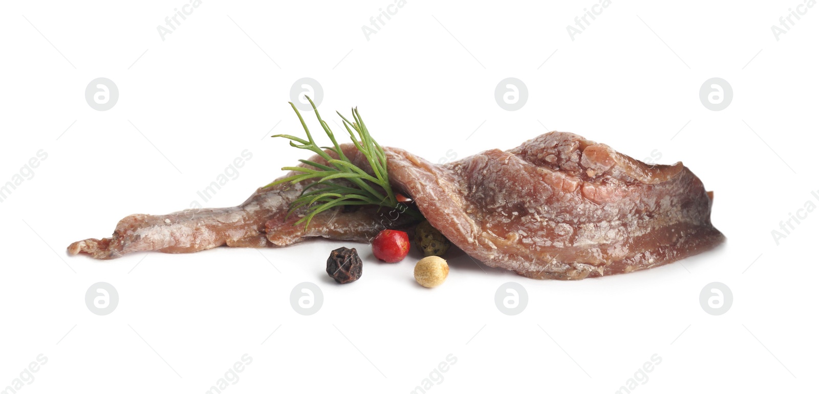 Photo of Delicious anchovy fillets, dill and spices on white background