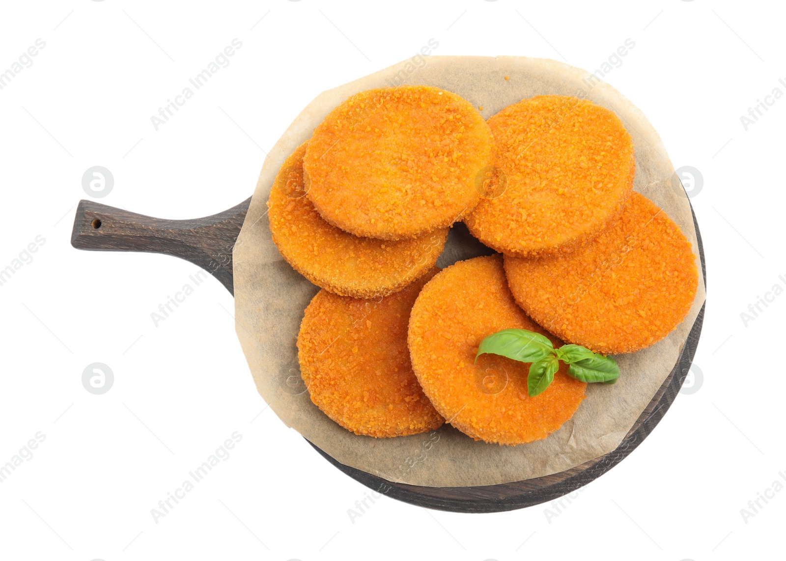 Photo of Delicious fried breaded cutlets with basil leaves isolated on white, top view