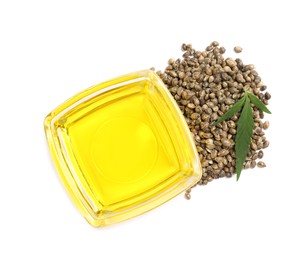 Photo of Hemp oil, fresh leaf and seeds on white background, top view
